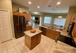 Overlooking the golf course with spacious interior!