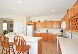 Private pool with waterfall feature. Popular 4 bed, 3 bath villa in Windwood Bay