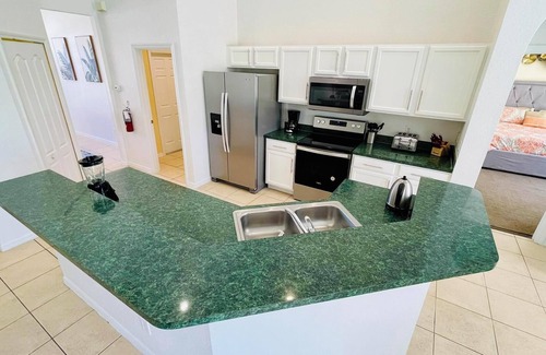 Highlands Reserve House | Ample space and modern elegance await at this 5/3 Pool Home located at Highlands Reserve Golf and Country Club