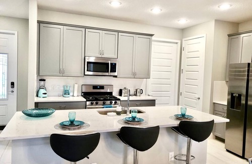 Reunion House | LUXURY Modern Reunion Resort Home . Golf Course Views, Pool Access, near Disney!