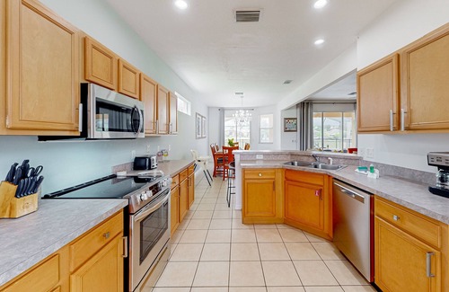 Calabay Parc House | Snowbird-friendly home near Disney with private heated pool, spa, pool table, AC