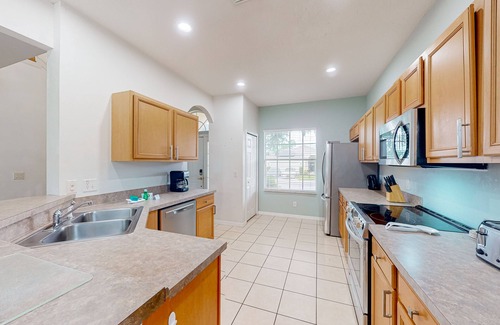 Calabay Parc House | Snowbird-friendly home near Disney with private heated pool, spa, pool table, AC