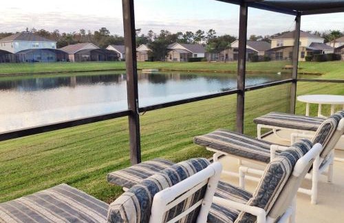 Lake Berkley House | Sunny South Facing Pool with Hot Tub and Lake View Near Disney