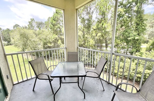 West Kissimmee Condo | 19-202 Gated Resort, Private balcony, heated pool, minutes from Disney! gym