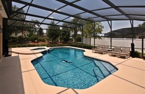 Grand Reserve Villa | 5BR Executive Villa Large Pool Gated Community in Championsgate area near Disney