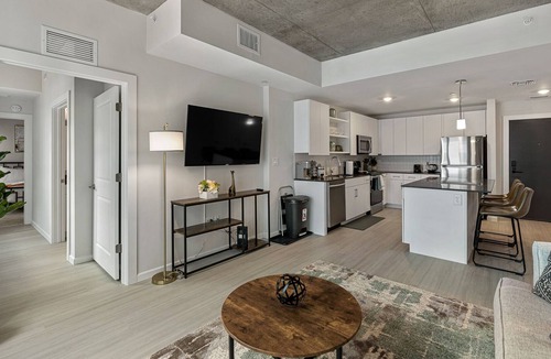 Callahan Apartment | Downtown King Bed Get Away w/Pool & Parking 01