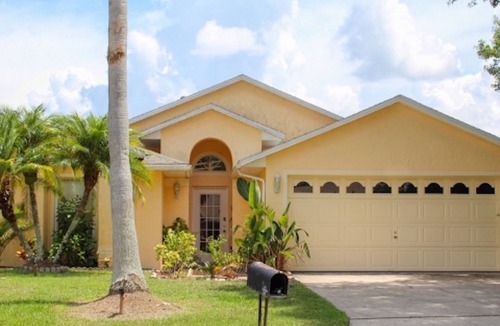 Windward Cay Villa | Florida Villa Lake Side View with 36ft South facing Pool & Spa in Windward Cay