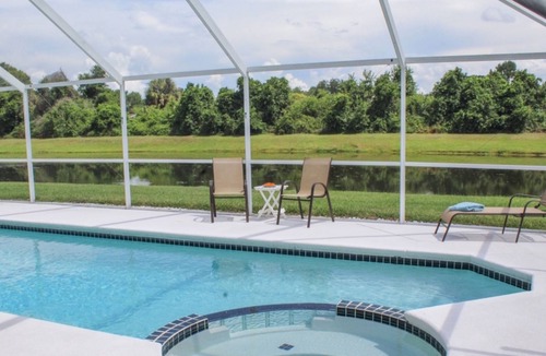 Windward Cay Villa | Florida Villa Lake Side View with 36ft South facing Pool & Spa in Windward Cay