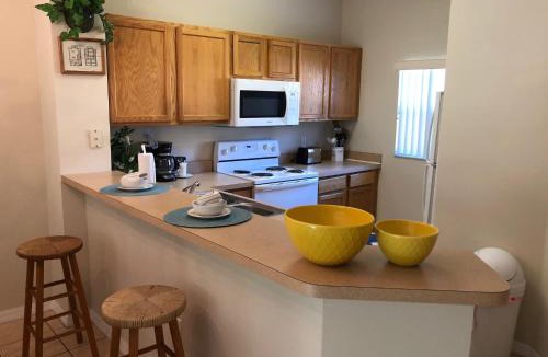 West Kissimmee House | Gated Emerald island resort townhome, Overlook Pool, 3 miles to Disney, rent by owner