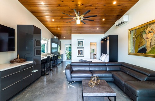 Audubon Park House | Hip RetroModern Lakefront Cabana with EV Charging Station
