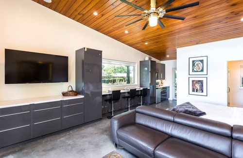 Audubon Park House | Hip RetroModern Lakefront Cabana with EV Charging Station