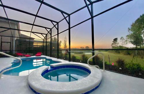 Loughman Villa | Marvelous Villa, South facing pool and hot tub, themed bedrooms near Disney