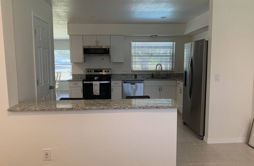 Indian Ridge House | Modern 4BR w/Heated Pool Near Disney