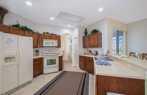 Crescent Lakes House | Near Disney Luxury Lakeside Villa with Spa and Wireless Internet