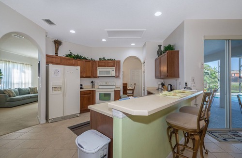 Crescent Lakes House | Near Disney Luxury Lakeside Villa with Spa and Wireless Internet