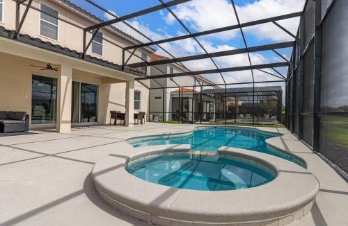 Loughman Villa | NEW! Sleep 32 Resort Pool Disney Theater 14BR 11BA