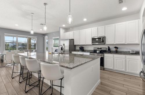 Loughman Villa | NEW! Sleep 32 Resort Pool Disney Theater 14BR 11BA