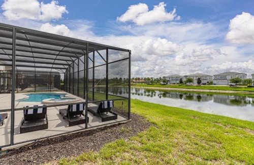Loughman Villa | NEW! Sleep 32 Resort Pool Disney Theater 14BR 11BA