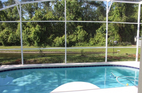 Pinewood Country Estates House | SOLAR HEATED POOL! minutes from Disney, Work from home in Florida!