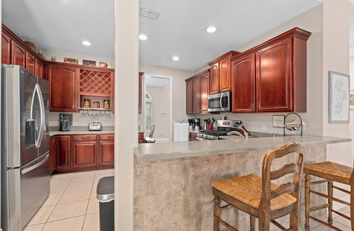 West Kissimmee House | South Facing Pool Hot Tub Themed Rooms Home Theater Swingset Splash Pad BBQ