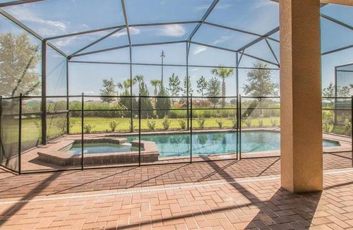 Loughman House | Stunning 7BR Resort Home with Private Pool, Hot Tub & Theater - Close to Disney!