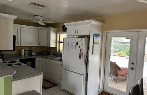 Longwood House | This Charming House with an outdoor pool, 3 bedrooms, 2 full baths.