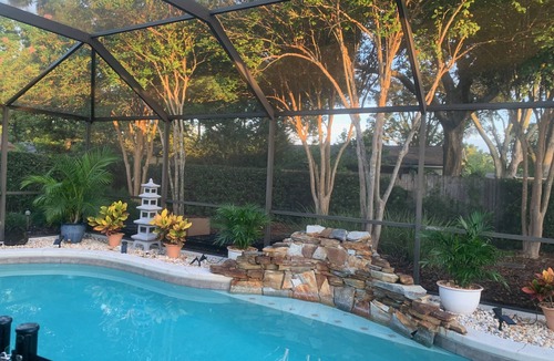 Longwood House | This Charming House with an outdoor pool, 3 bedrooms, 2 full baths.
