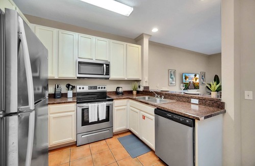West Kissimmee Condo | Upstay: Tropical Style Family Condo w Pool/Hot Tub