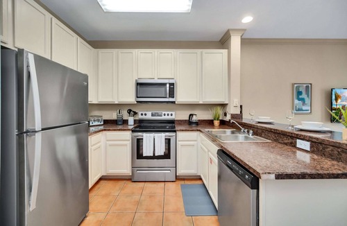 West Kissimmee Condo | Upstay: Tropical Style Family Condo w Pool/Hot Tub
