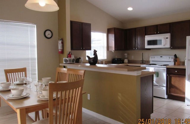 Lake Wilson Preserve 4/2 Pool Home property, fully furnished, with full kitchen, and all linens and