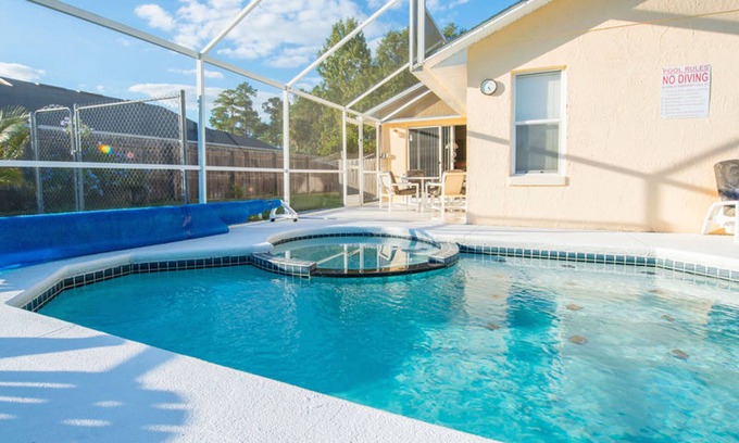 Windward Cay Villa | Florida Villa Lake Side View with 36ft South facing Pool & Spa in Windward Cay