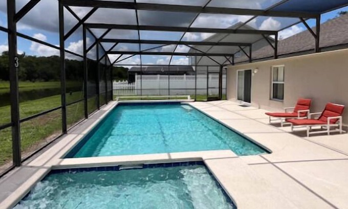 Crescent Lakes House | Lake View - South Facing Pool & Spa - Game Room - Nr Disney - Quiet Community