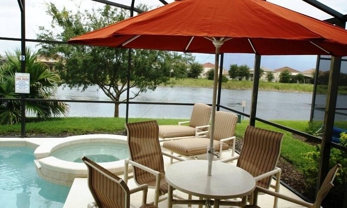 Four Corners Villa | Lakeside Villa - Highend Luxury & Elegance near Disney w/South Facing Pool/Spa